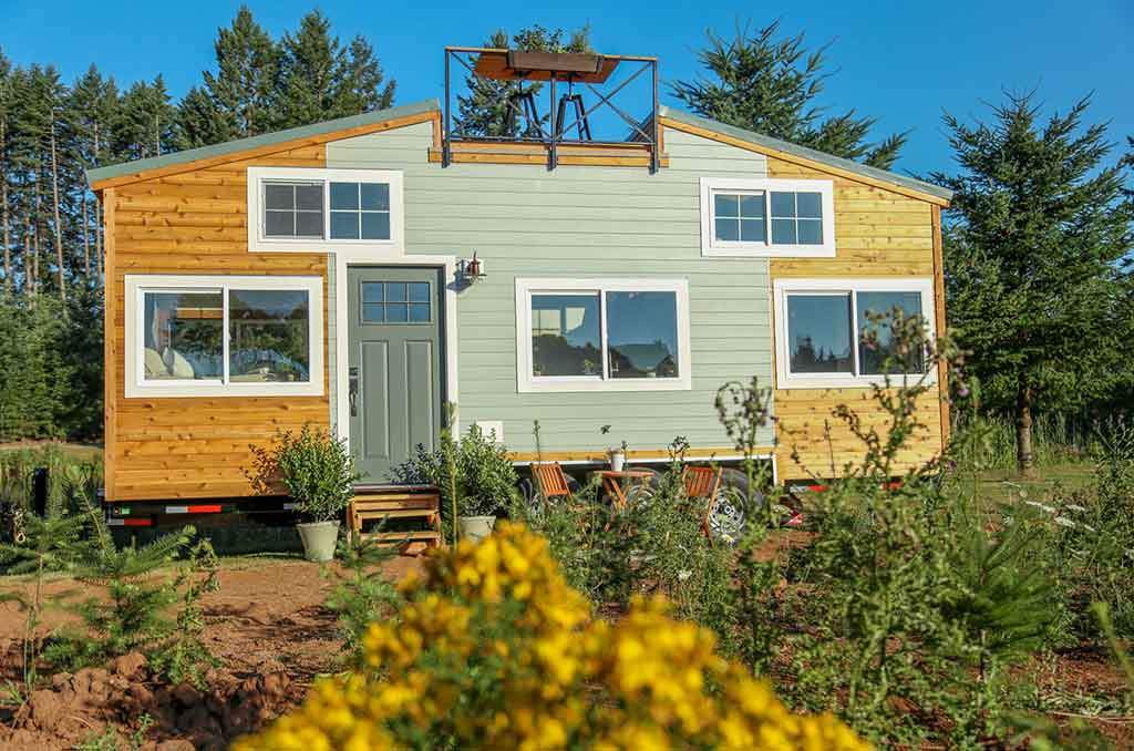 “Rustic Farmhouse” Tiny House on Wheels by Tiny Heirloom