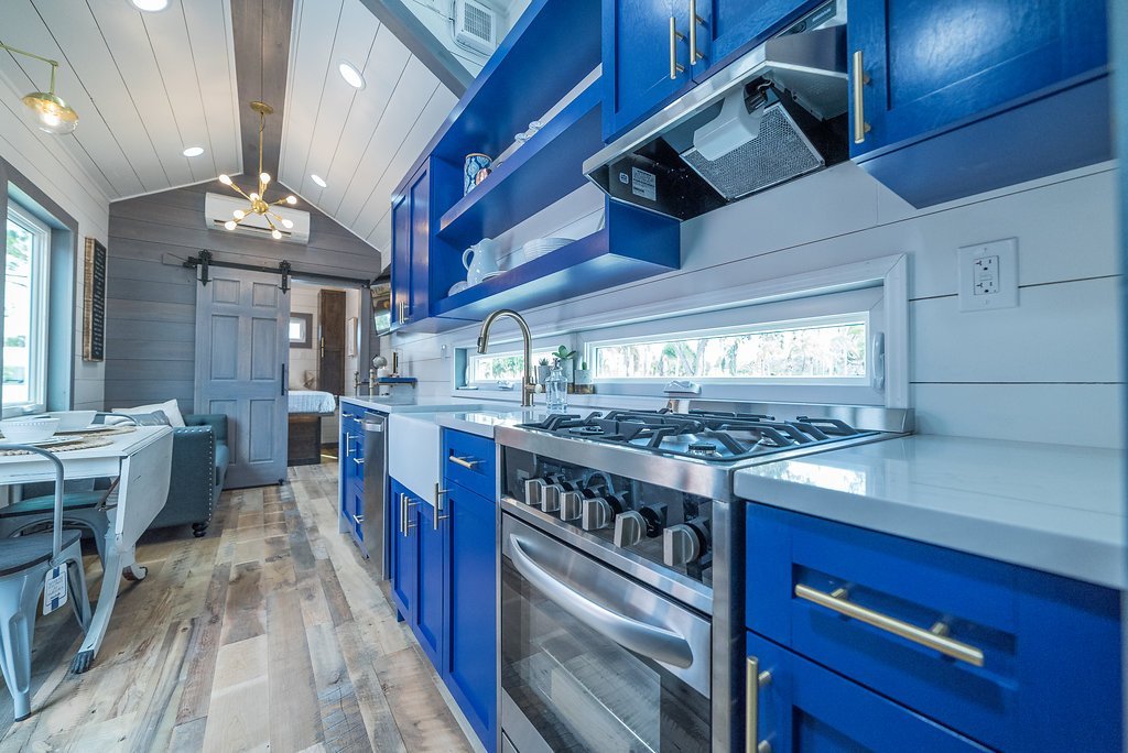 The Blue "Henderson" Tiny House by Movable Roots in Melbourne, Florida