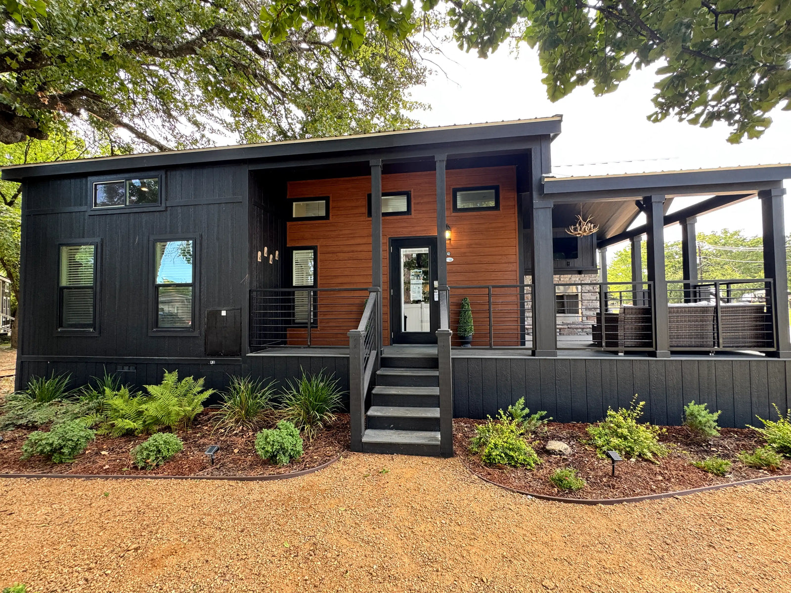 Downsized Delight—A 399-sqft Tiny Home with a Wraparound Porch & Loft